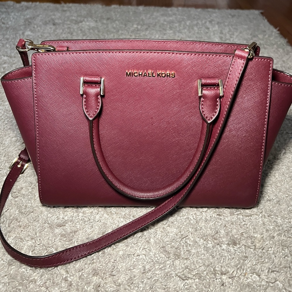 Micheal Kors medium size burgundy bag
